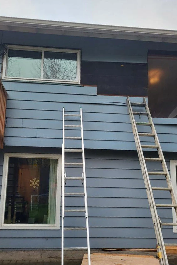 damaged siding being prepped for repair | sister siding