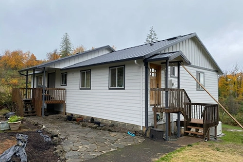 new siding and paint job | sister siding