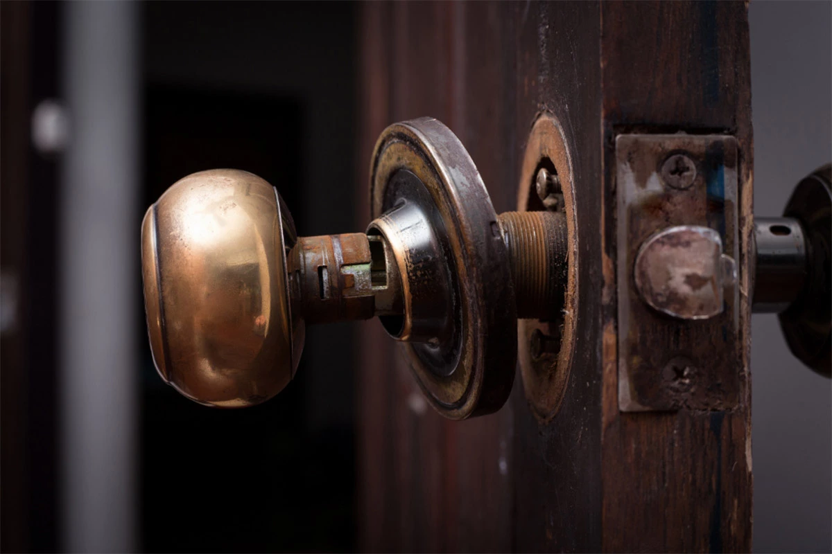 old and broken door knob | sister siding