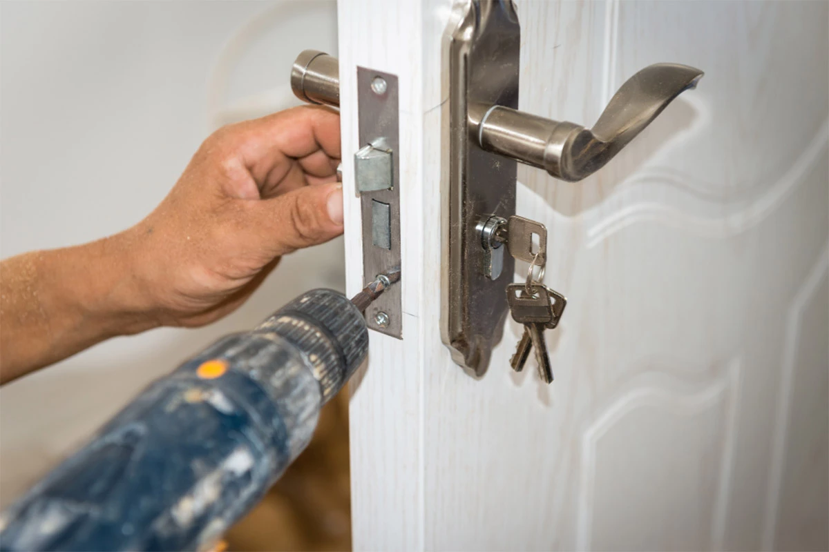 installation of new lock on new door | sister siding