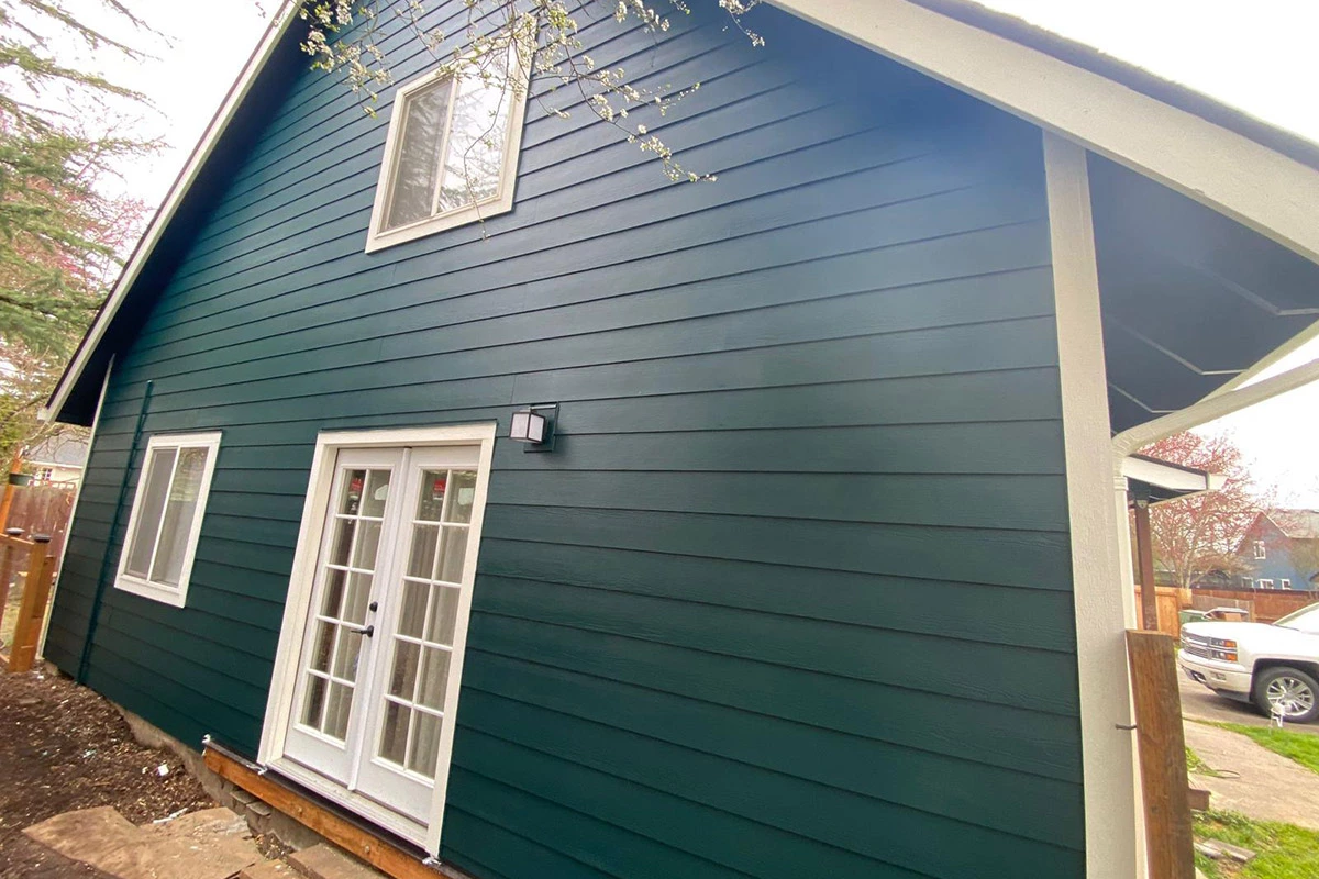 new white door and blue paint job | Sister Siding