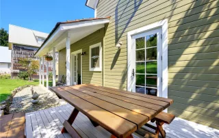 green house, white trim | sister siding