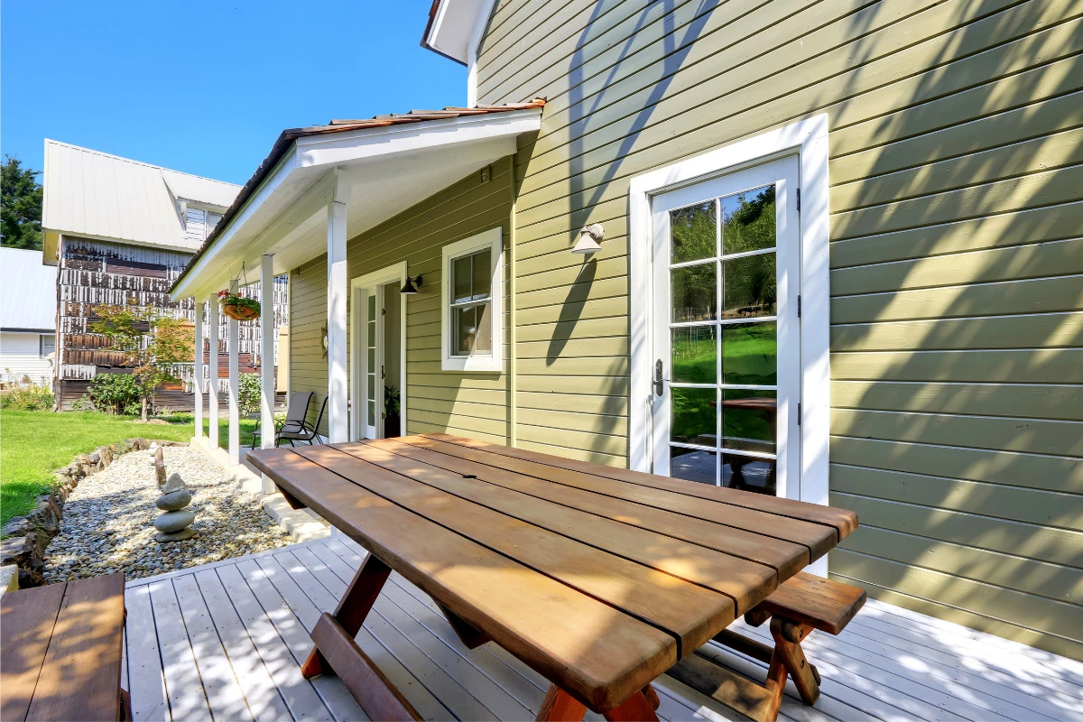 green house, white trim | sister siding