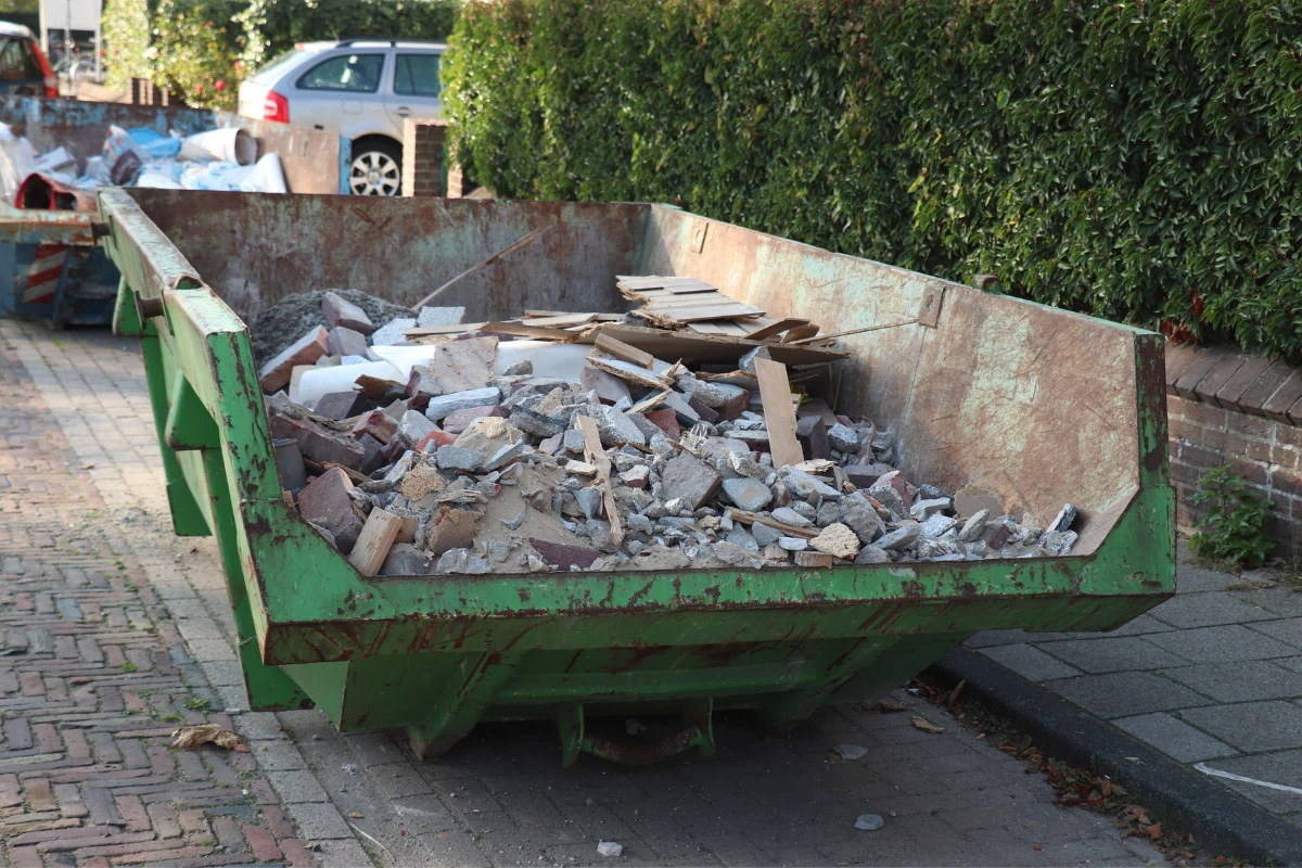 siding dumpster in driveway | sister siding