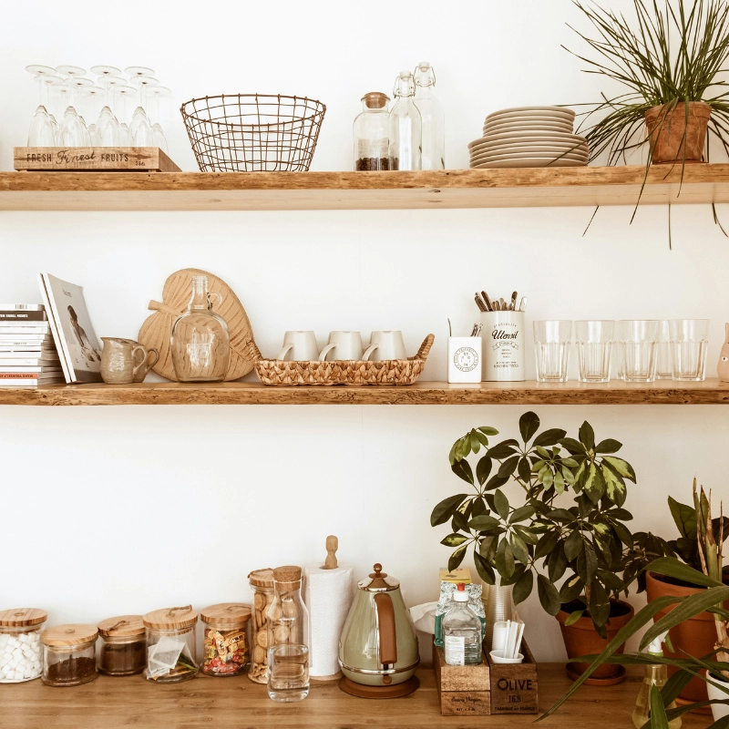 shelf filled with breakable items | sister siding