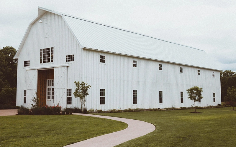 white-barn-with-vertical-siding