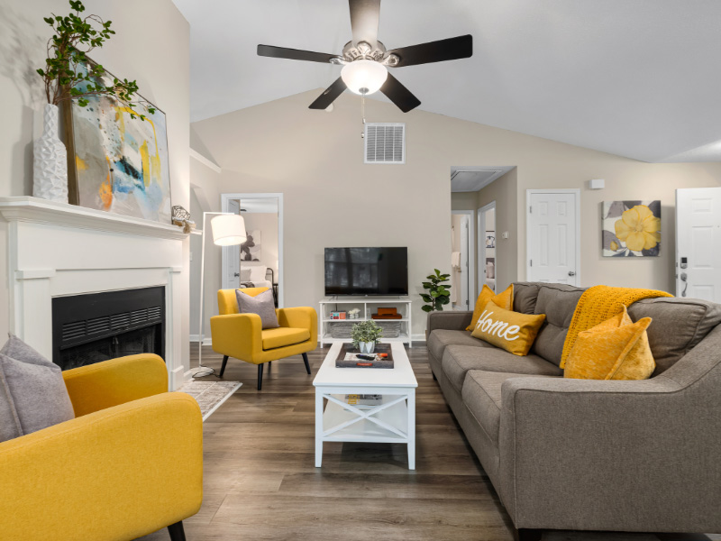 staged-modern-living-room-with-yellow-accents-throughout