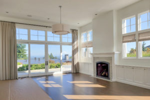Bronzan 2 (2) Bright living room with a fireplace and large windows