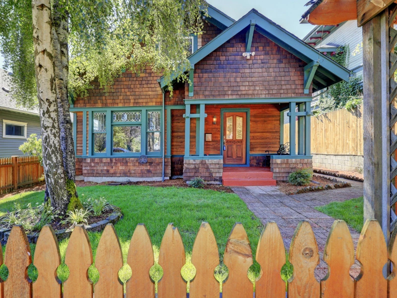 house-with-wooden-siding-and-wooden-fence-in-the-pacific-northwest