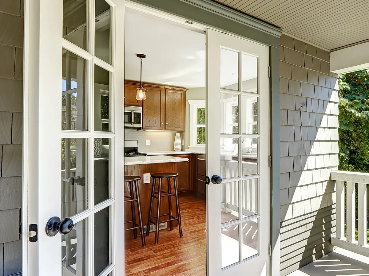 newly installed glass french door | Sister siding