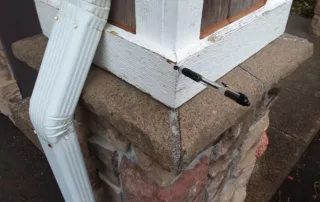 photo of a house with dry rot