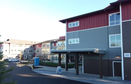 Albany1after Commercial building with red and gray exterior siding